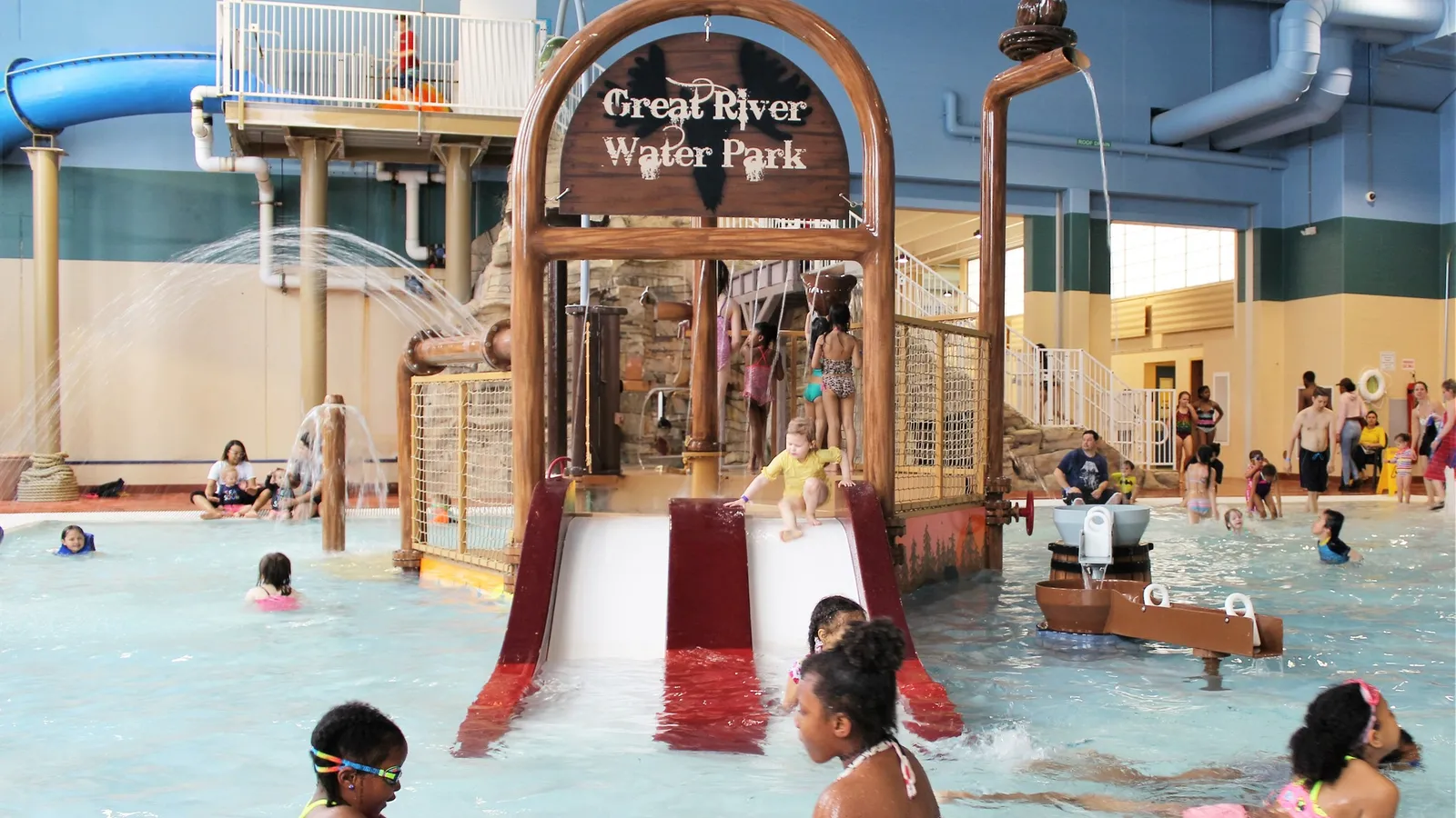 Families enjoying slides at Great River Water Park