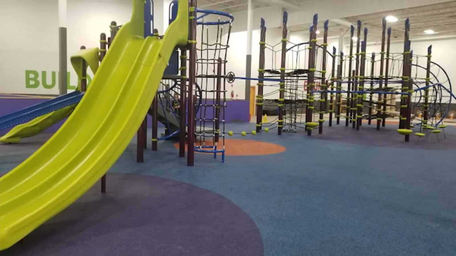 Kids sliding at InnerActive Playground in Mounds View