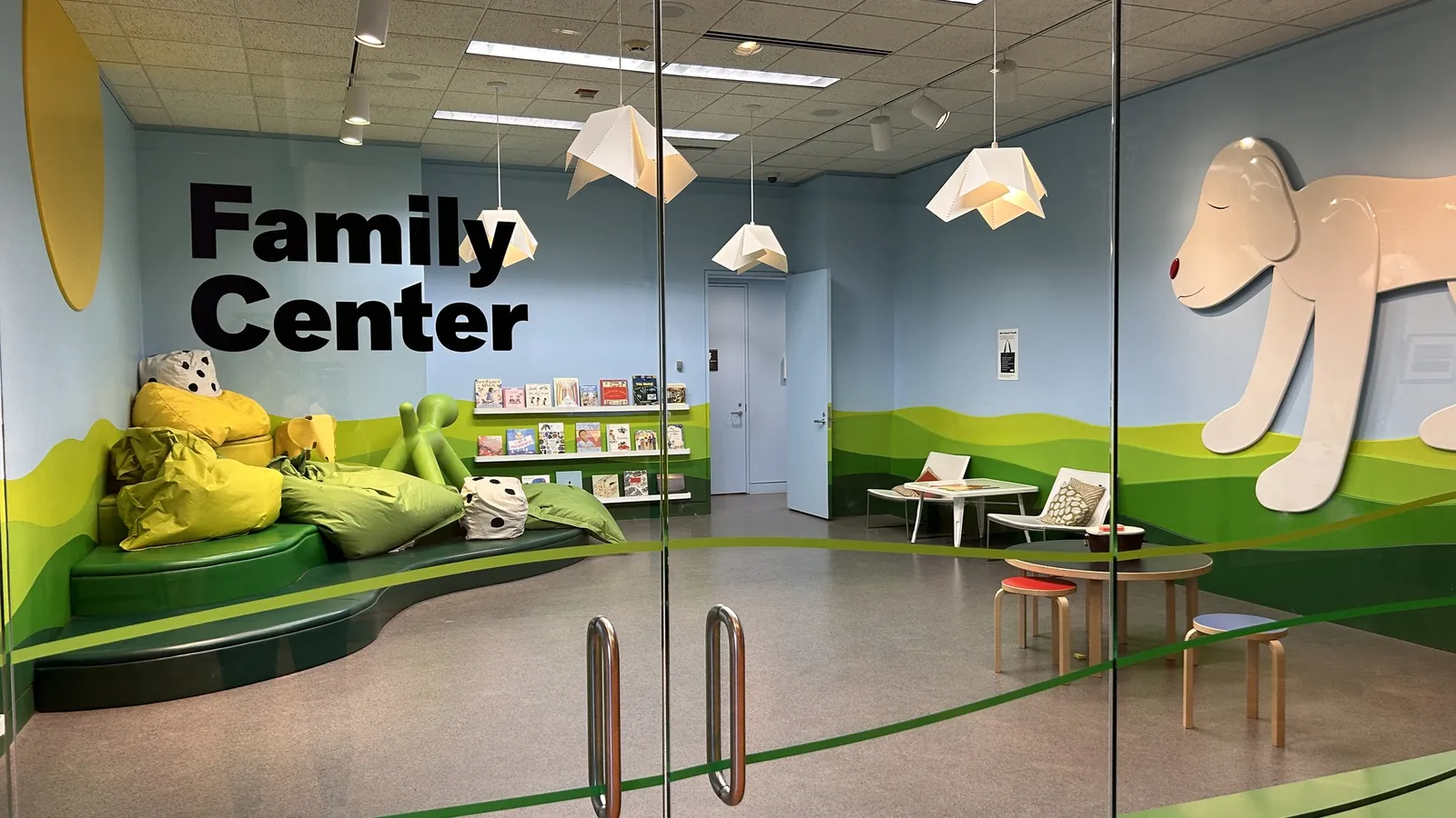 Children reading in the MIA Family Center play space