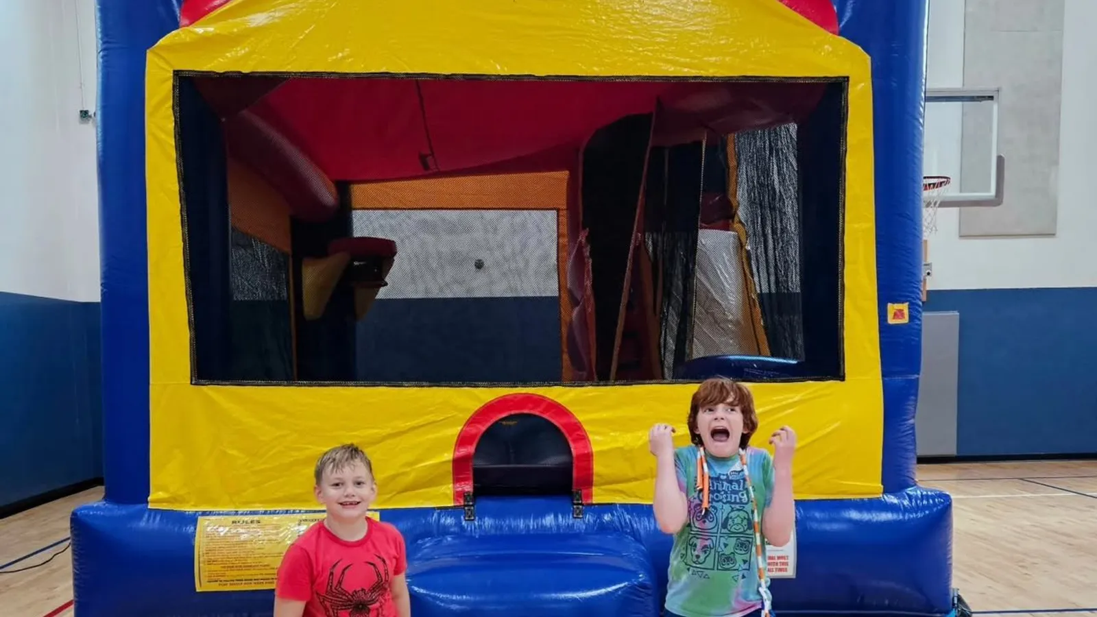 Children playing on indoor turf at the Rookery Activity Center