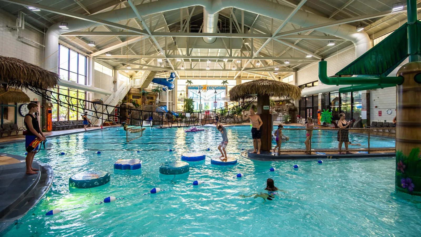 Families playing in the Shoreview Tropics indoor waterpark