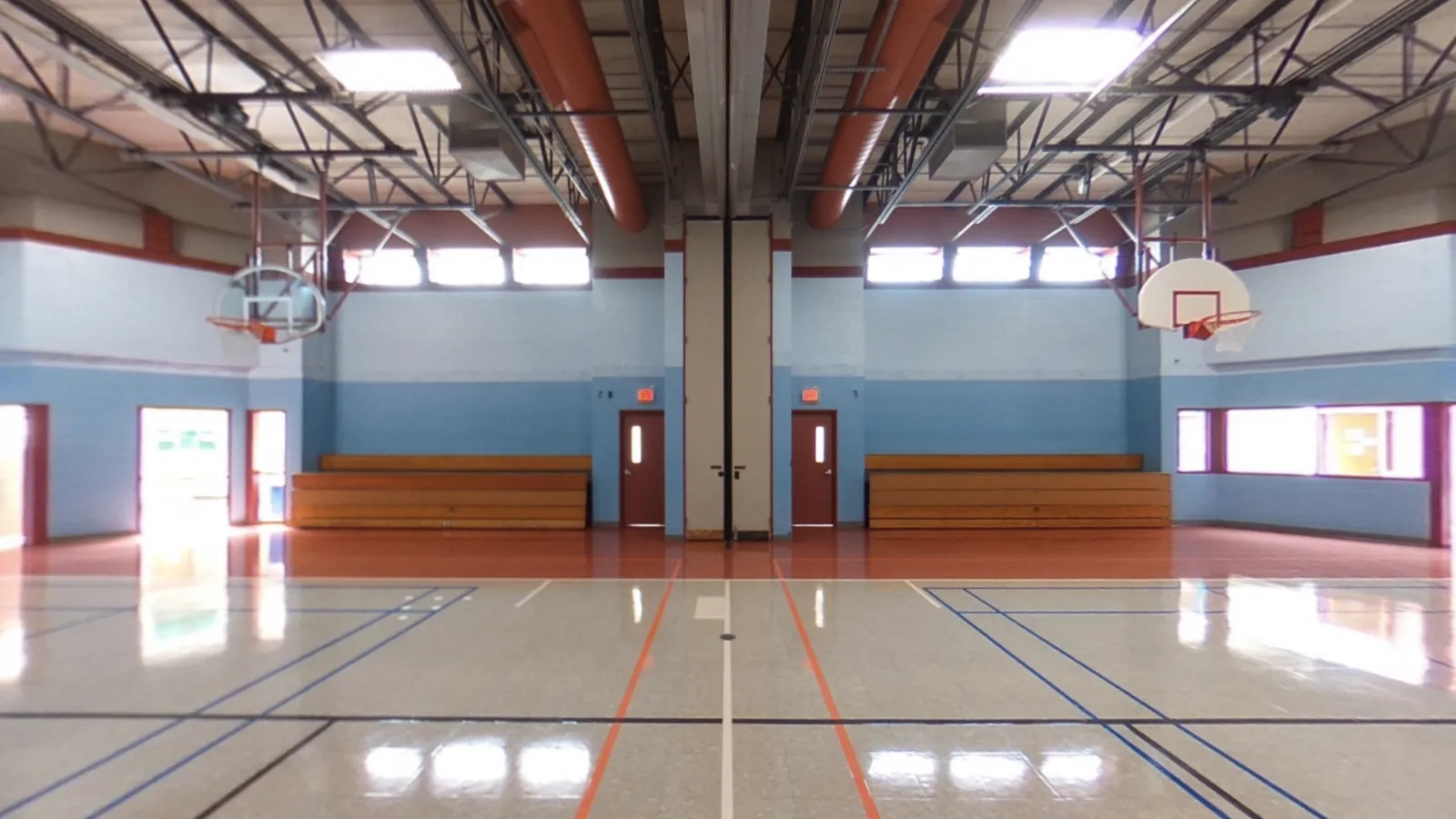 Children dancing and playing with balls in a gym